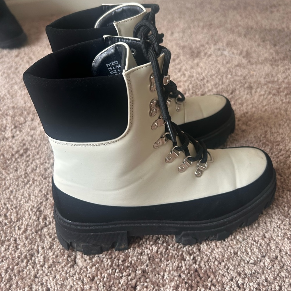 Black and white combat boots